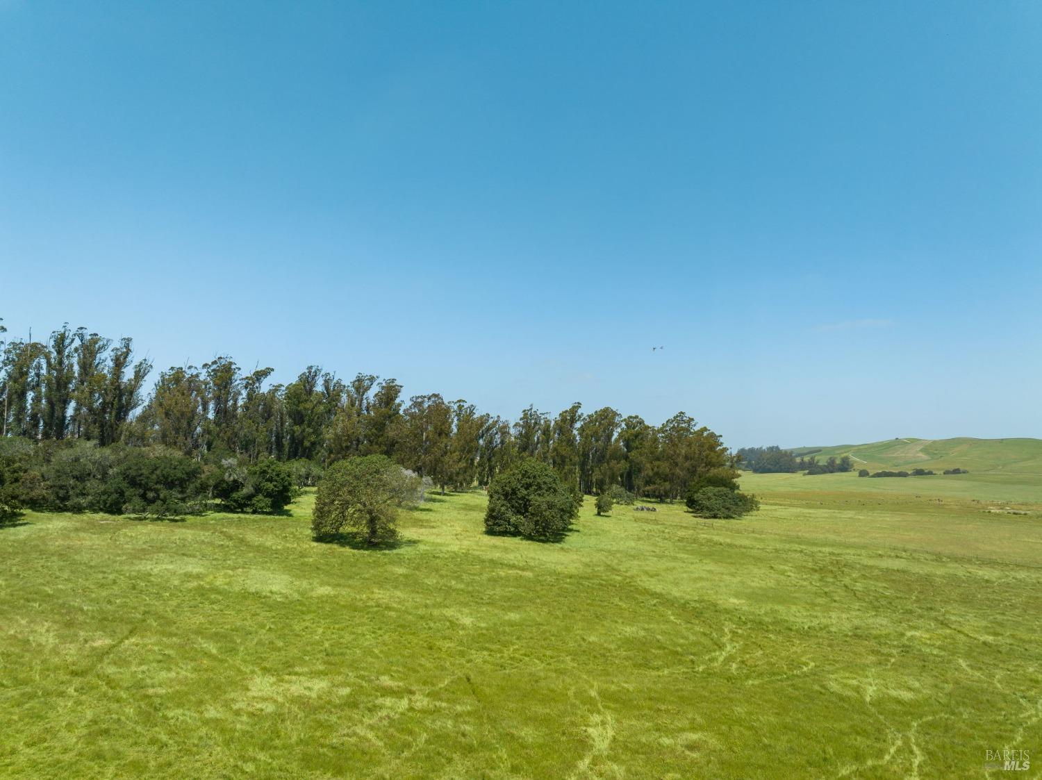 130 Jewett Road Petaluma, CA 94952 - Photo 21 of 31 a view of a lake with houses in the background