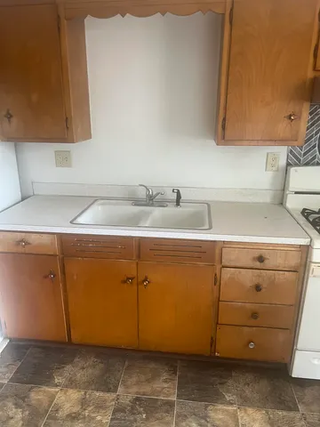 a utility room with a sink