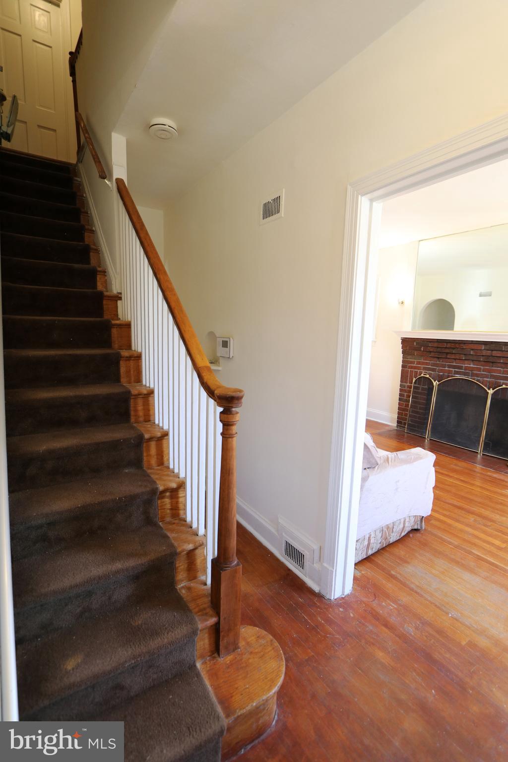 2038 34th Street Southeast Washington, DC 20020 - Photo 20 of 32 a view of entryway and hall with wooden floor