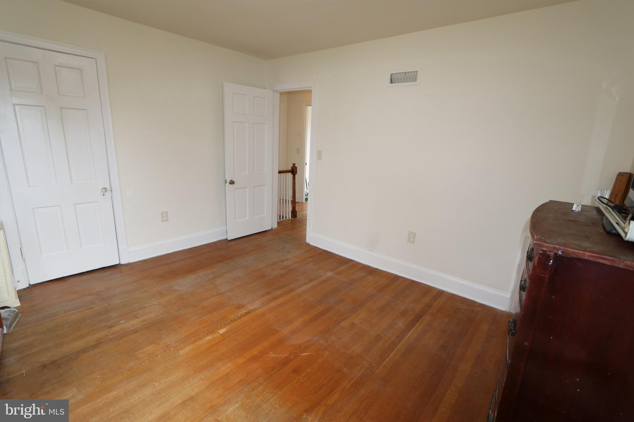 2038 34th Street Southeast Washington, DC 20020 - Photo 23 of 32 a view of empty room with wooden floor