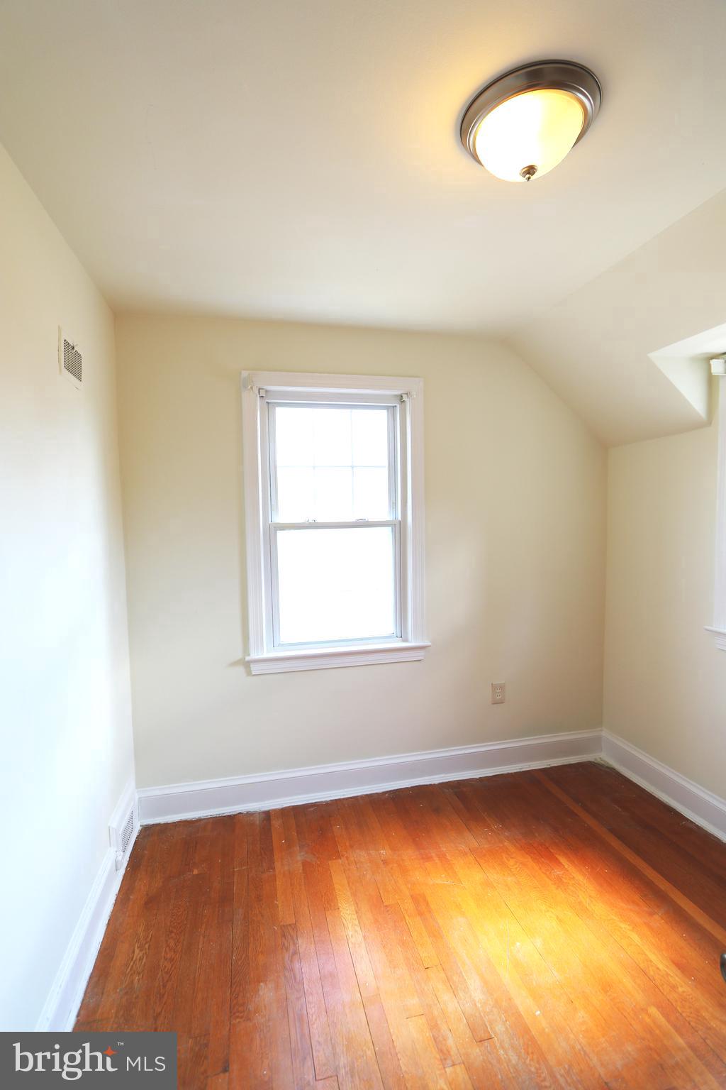 2038 34th Street Southeast Washington, DC 20020 - Photo 28 of 32 an empty room with a window