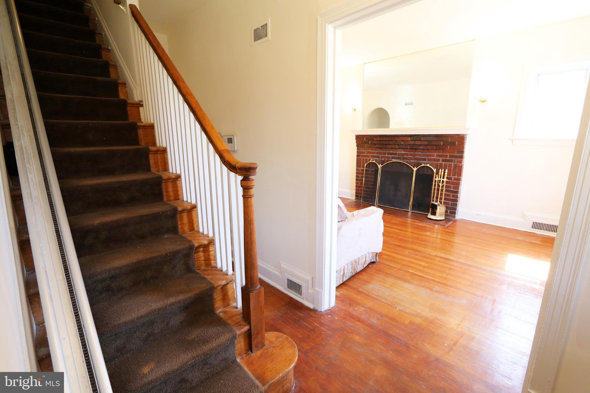 2038 34th Street Southeast Washington, DC 20020 - Photo 3 of 32 a view of entryway and hall with wooden floor