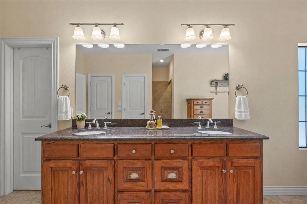 7320 Sandy Lake Road Quinlan, TX 75474 - Photo 20 of 38 Master suite bath with huge shower and jetted tub