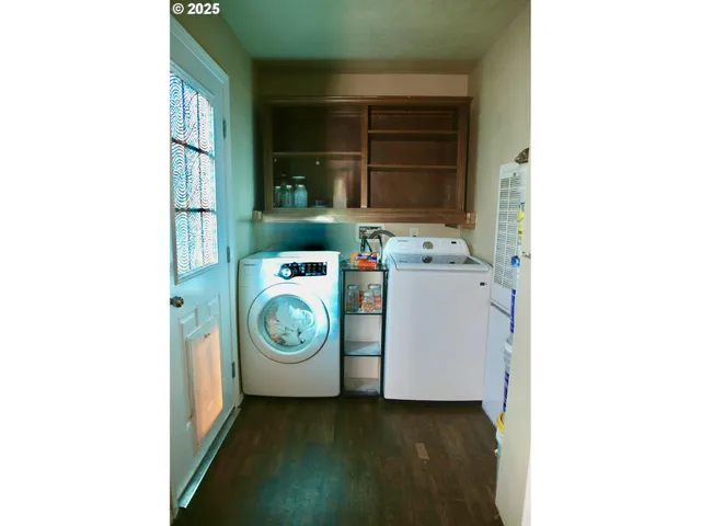 a utility room with dryer and washer