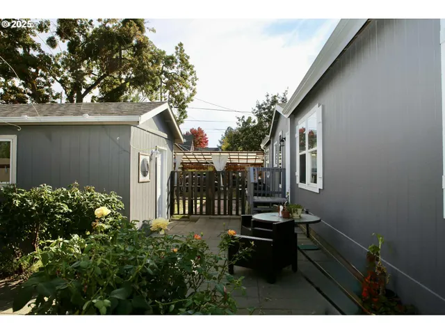 a backyard of a house with lots of green space