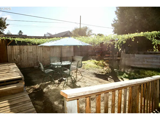 a view of a balcony with chairs