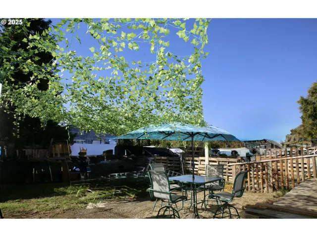 a view of patio with chairs and tables