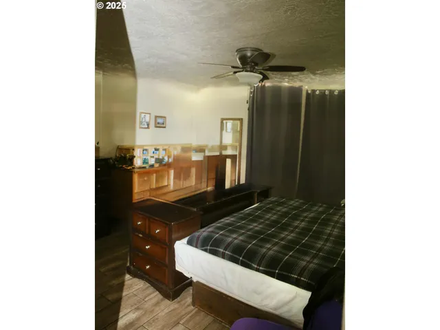 a kitchen with a stove and a refrigerator