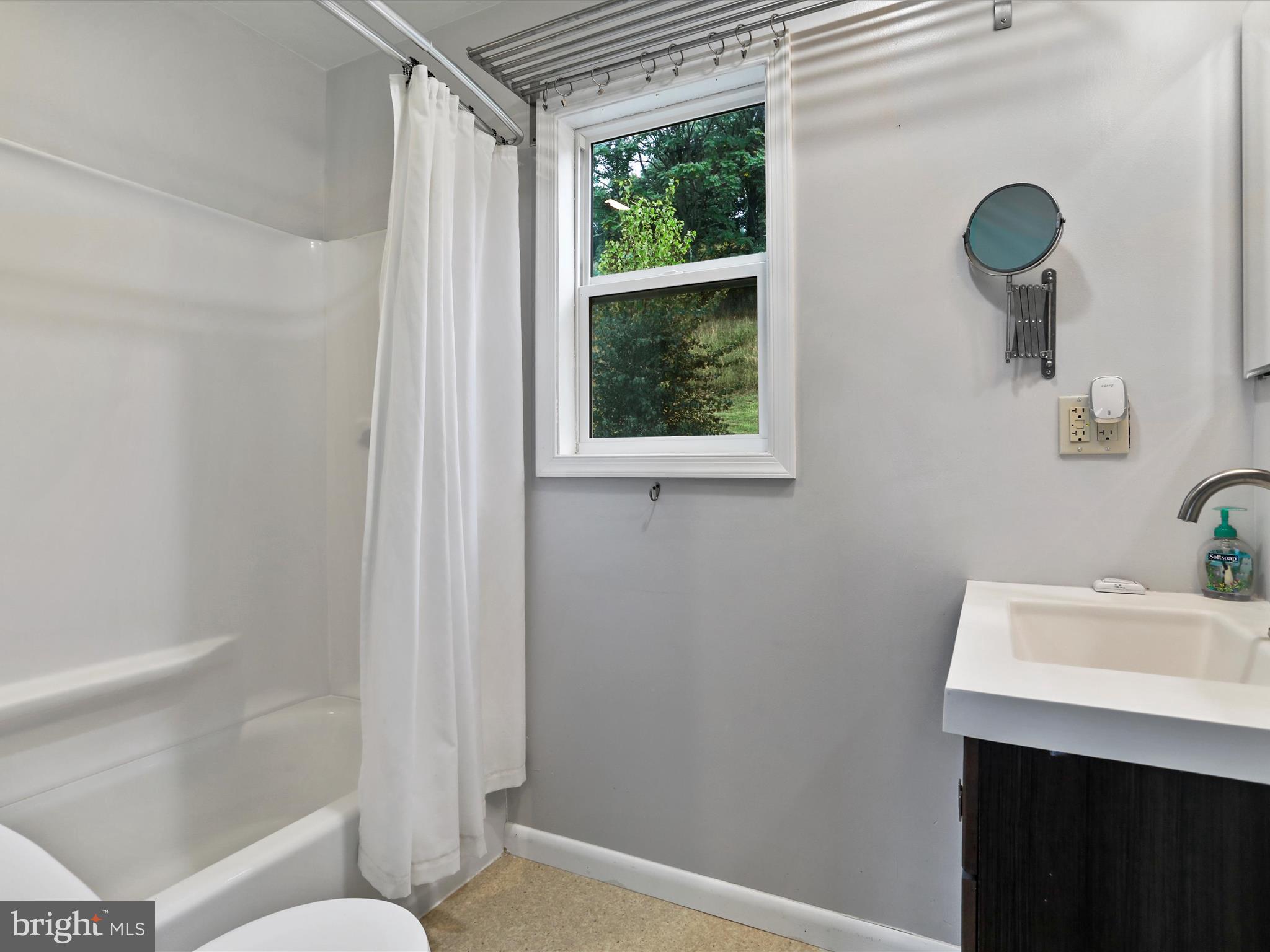 9475 Waxler Road Keyser, WV 26726 - Photo 16 of 61 a bathroom with a sink toilet and shower