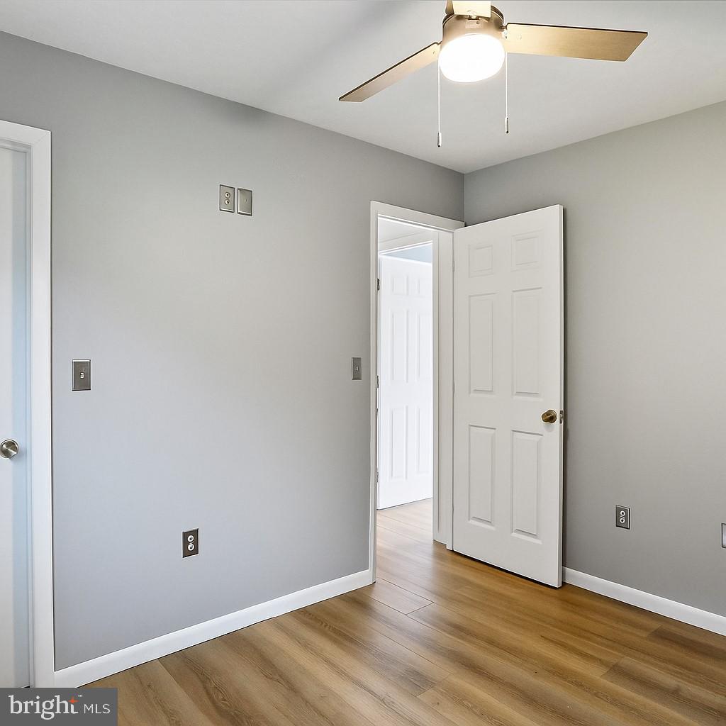 9475 Waxler Road Keyser, WV 26726 - Photo 24 of 61 a view of an empty room with wooden floor