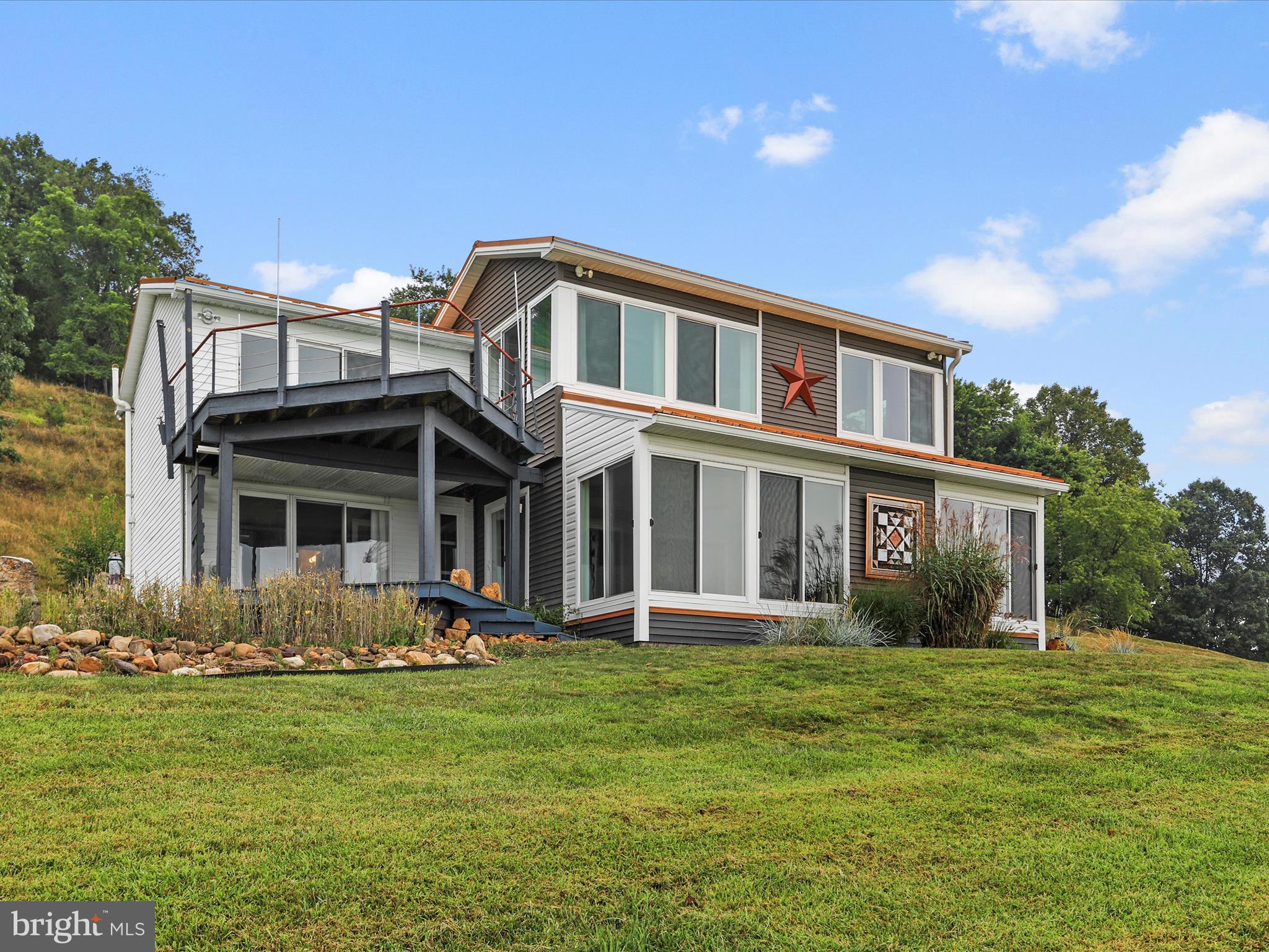 9475 Waxler Road Keyser, WV 26726 - Photo 48 of 61 a front view of a house with a yard