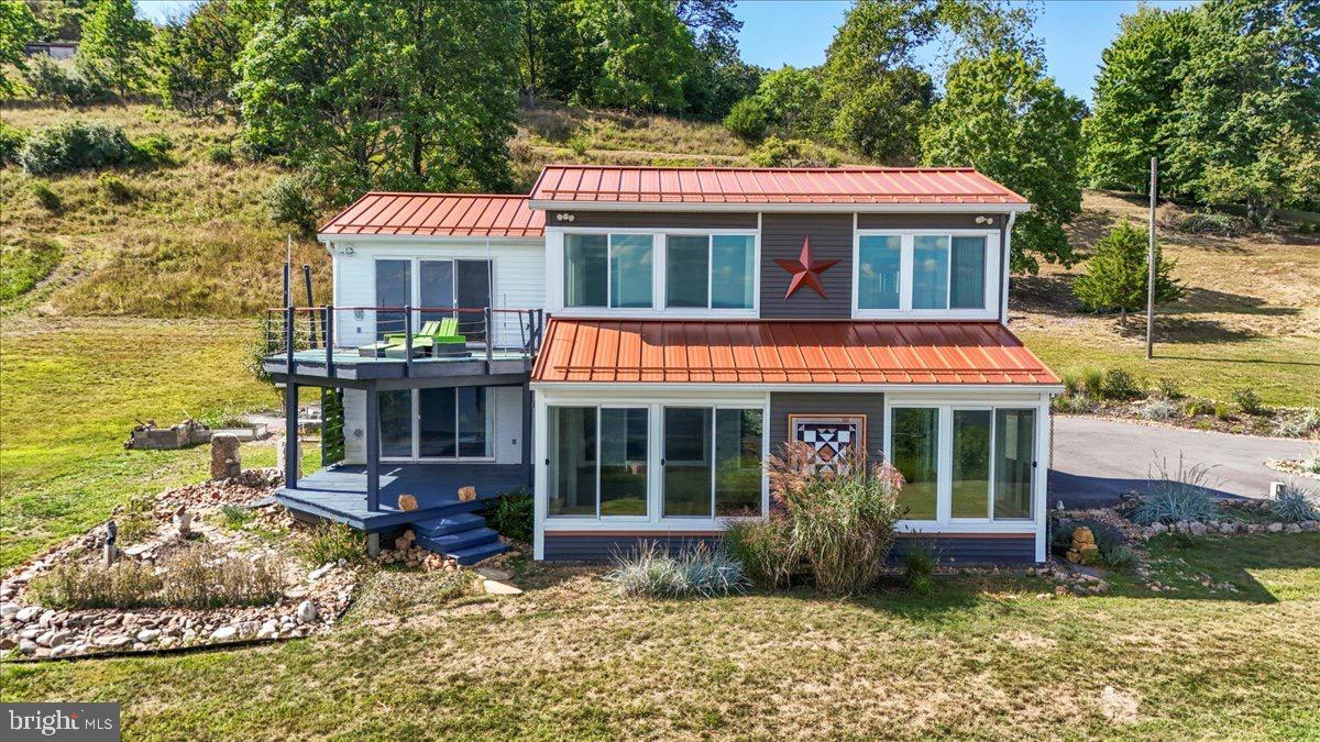 9475 Waxler Road Keyser, WV 26726 - Photo 50 of 61 a front view of a house with garden