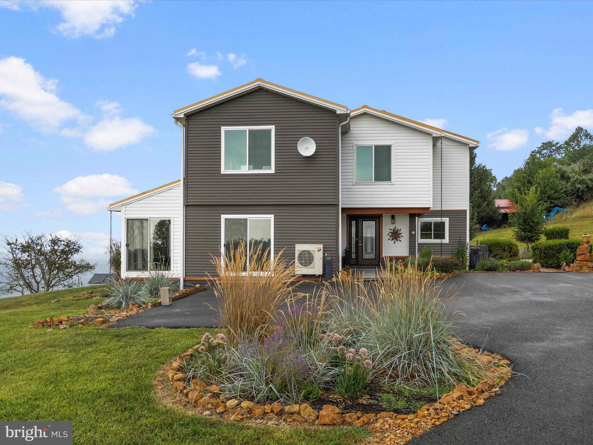 9475 Waxler Road Keyser, WV 26726 - Photo 61 of 61 a front view of a house with a yard