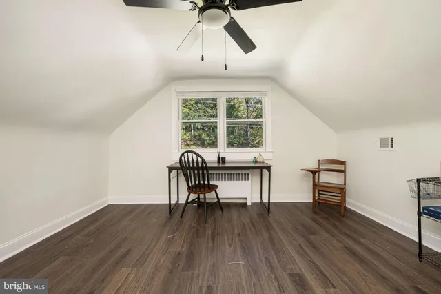 a workspace with wooden floor