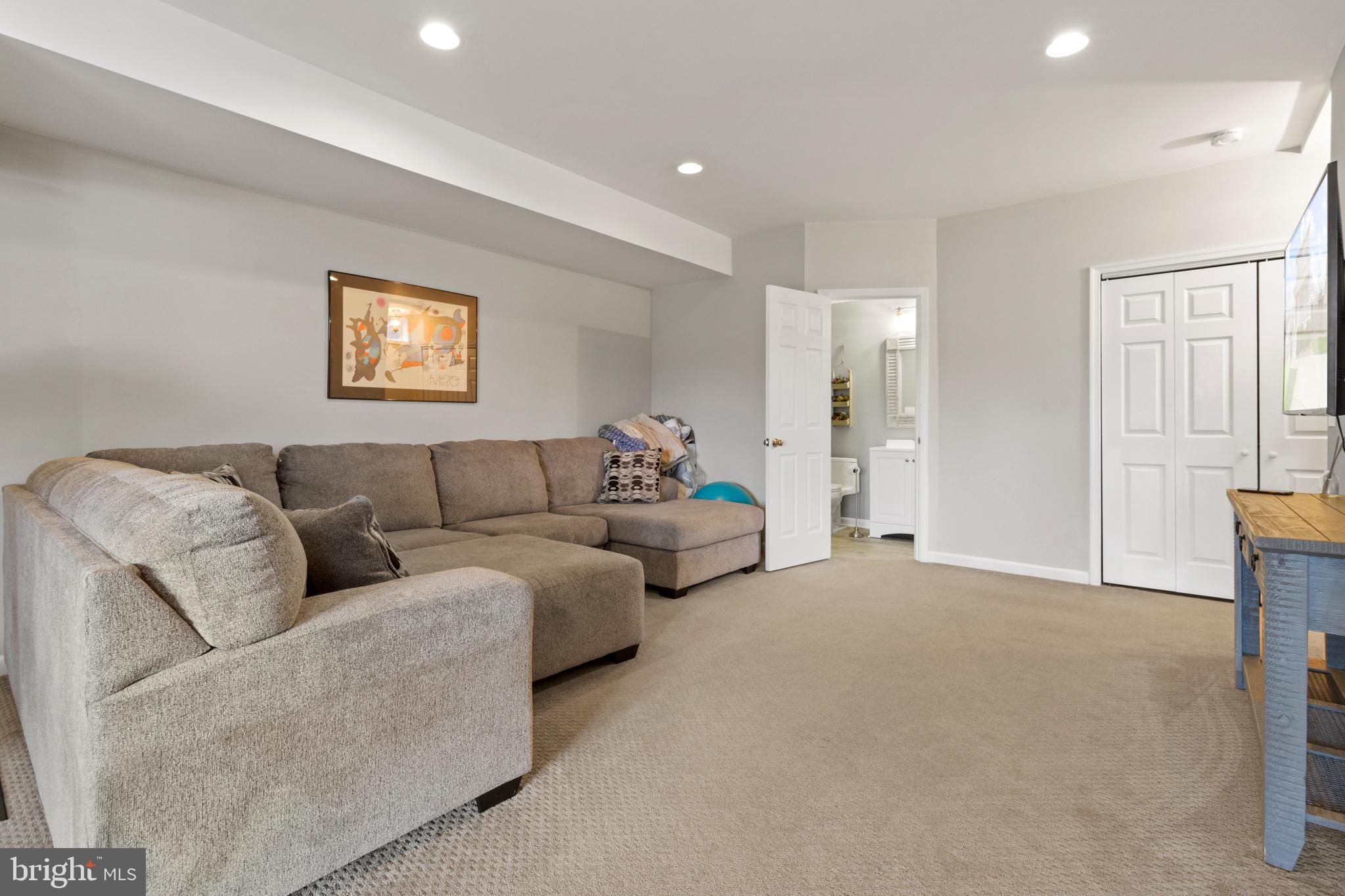 1615 Oldtown Road Edgewater, MD 21037 - Photo 25 of 35 a living room with furniture and a window