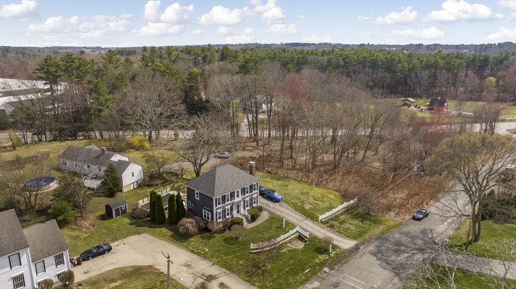 54 Old Merrill Street Amesbury, MA 01913 - Photo 4 of 34 a view of a lake in middle of forest