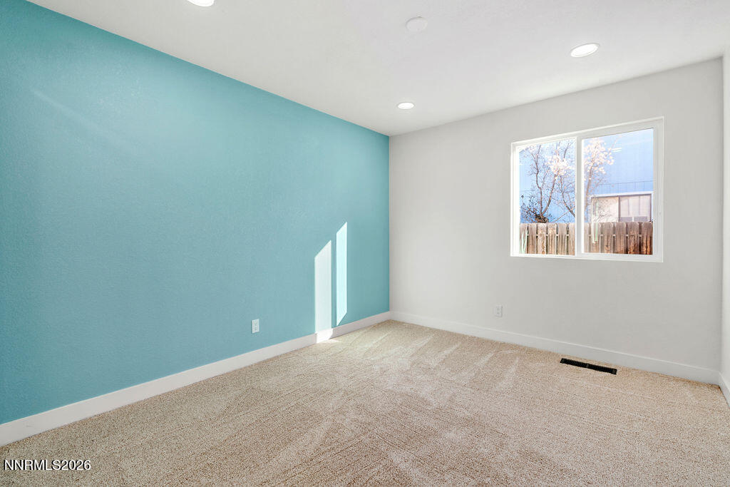 4804 Pinesprings Drive Reno, NV 89509 - Photo 18 of 32 a view of an empty room with a window