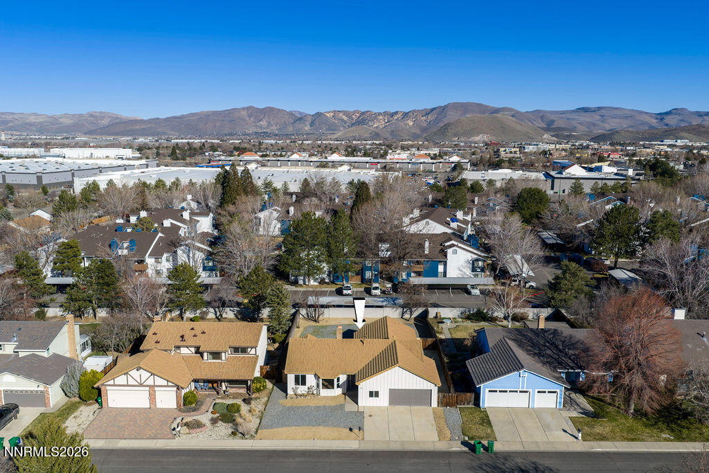 4804 Pinesprings Drive Reno, NV 89509 - Photo 29 of 32 an aerial view of a residential houses and city street