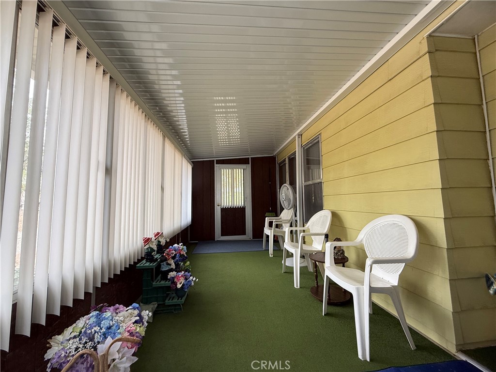 4878 Leonard Road, Unit 11 Mariposa, CA 95338 - Photo 12 of 15 a front view of a house with outdoor seating