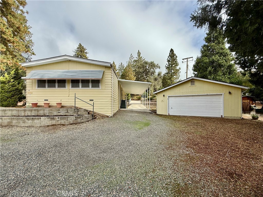 4878 Leonard Road, Unit 11 Mariposa, CA 95338 - Photo 2 of 15 a view of a house with a yard