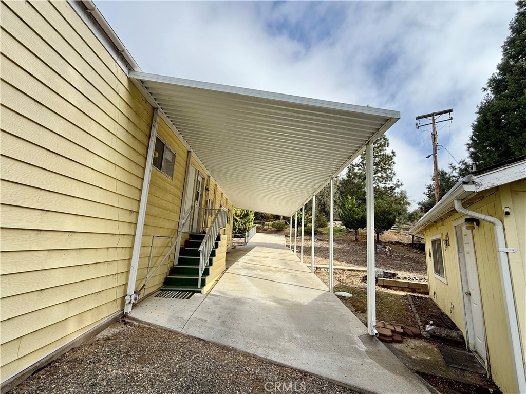 4878 Leonard Road, Unit 11 Mariposa, CA 95338 - Photo 3 of 15 a view of a house with a patio