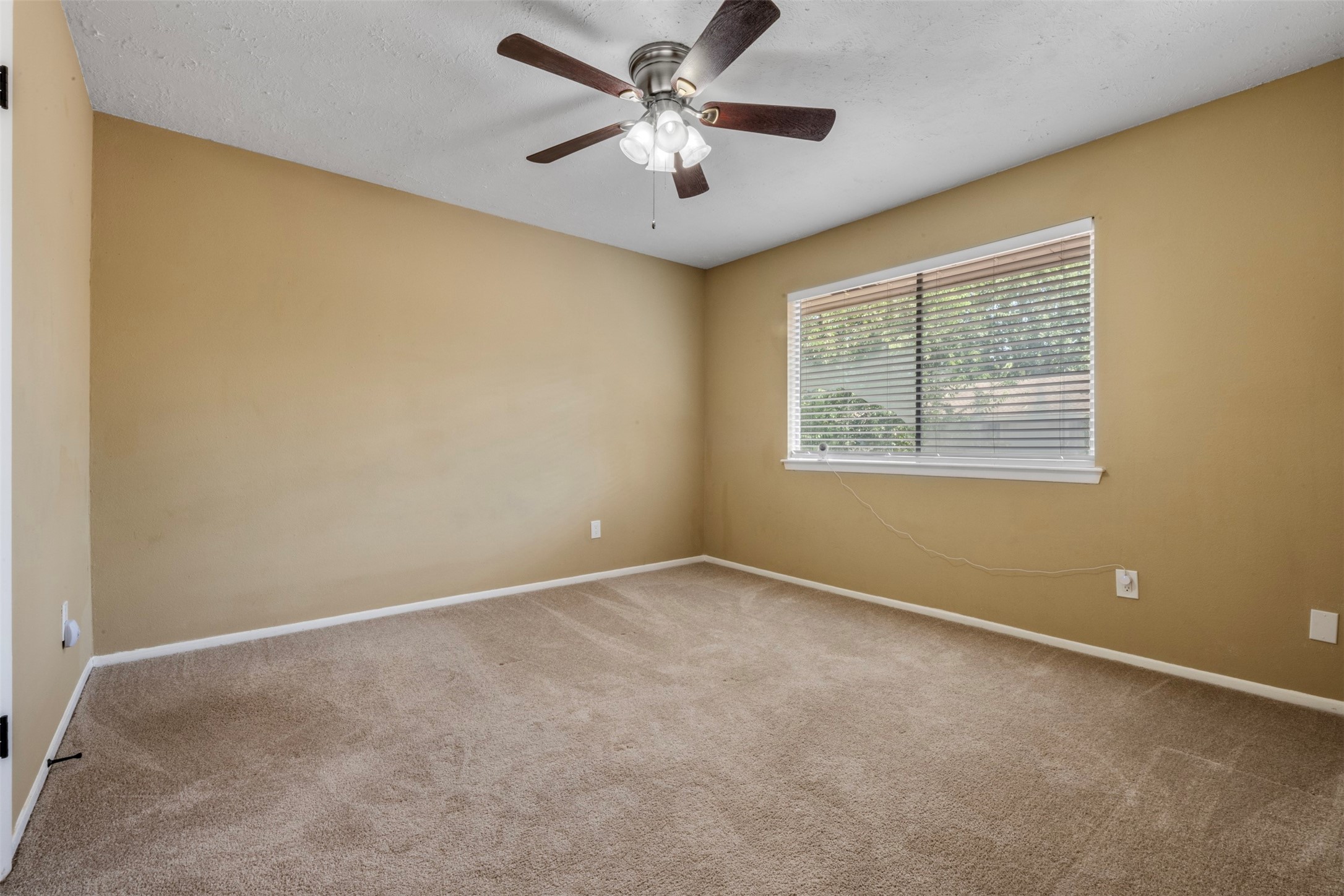 25306 Mill Pond Lane Spring, TX 77373 - Photo 20 of 37 a view of an empty room with a window