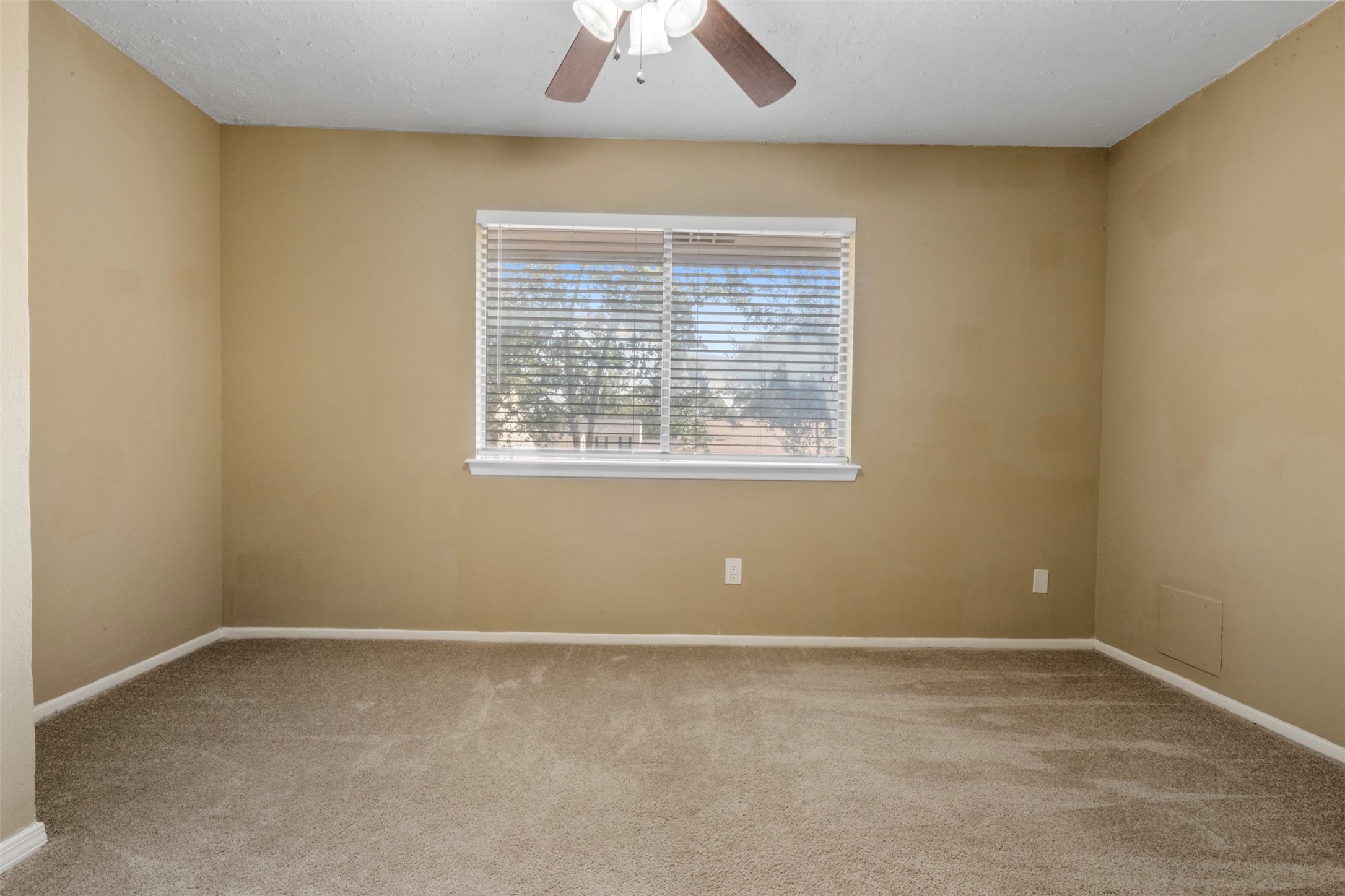 25306 Mill Pond Lane Spring, TX 77373 - Photo 21 of 37 an empty room with a window