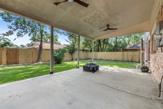 a view of backyard with green space