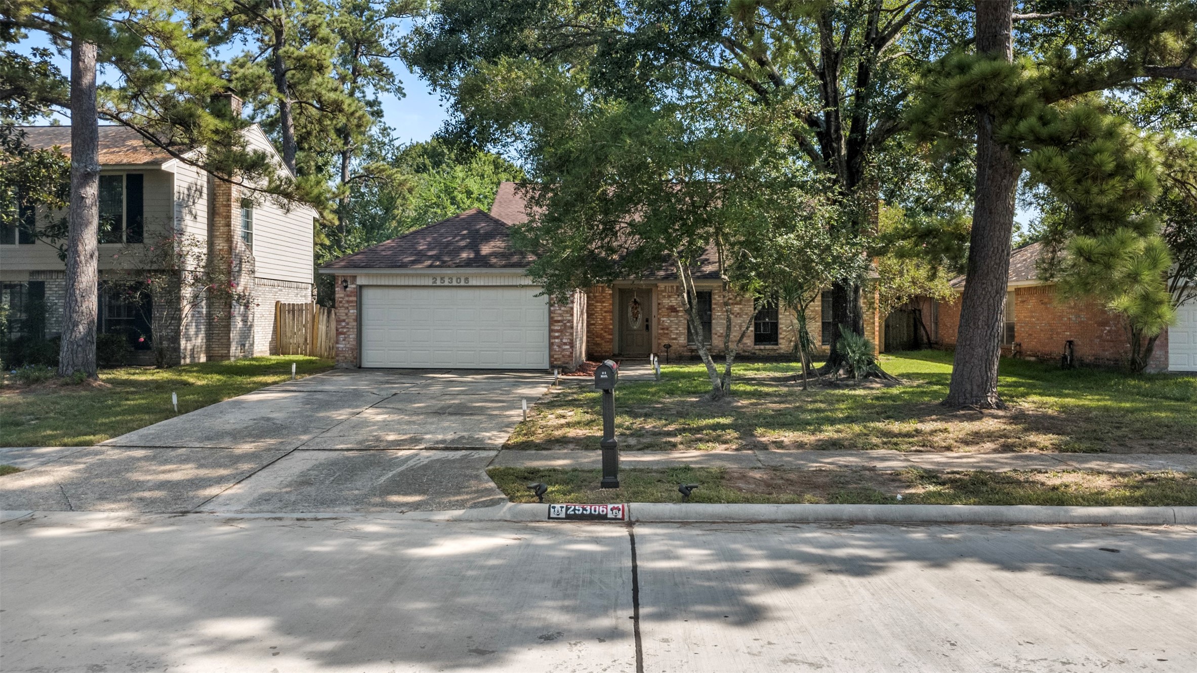 25306 Mill Pond Lane Spring, TX 77373 - Photo 29 of 37 a view of a house with a tree in front of it