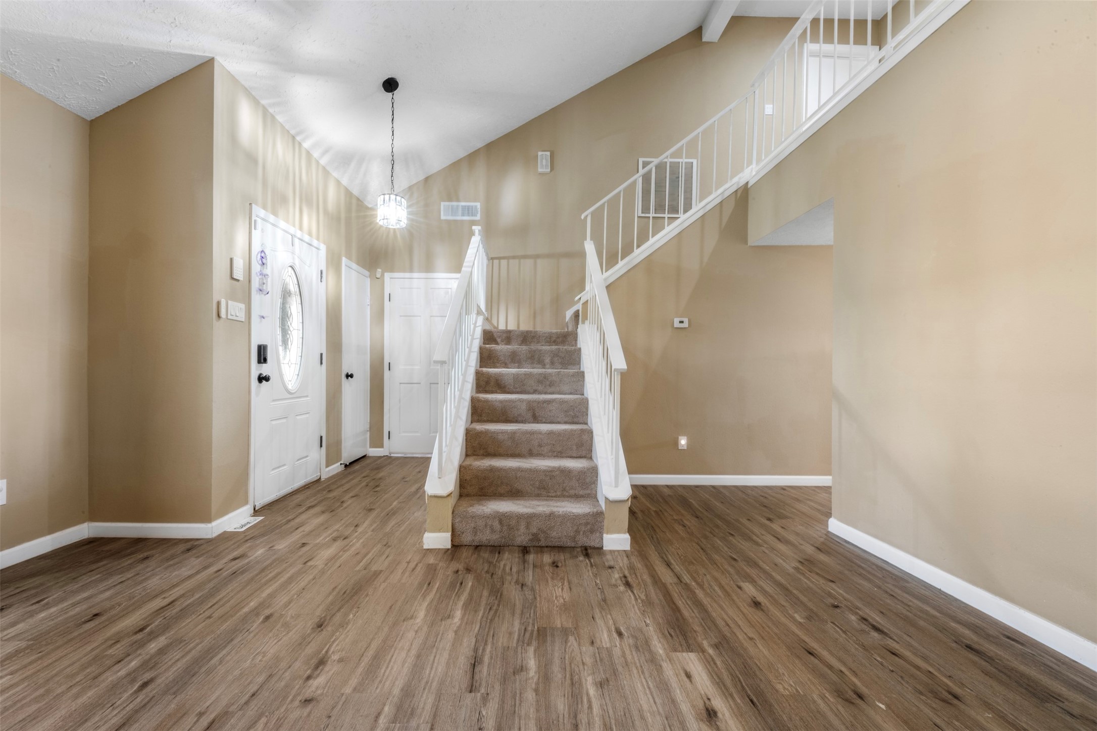 25306 Mill Pond Lane Spring, TX 77373 - Photo 3 of 37 a view of entryway with wooden floor