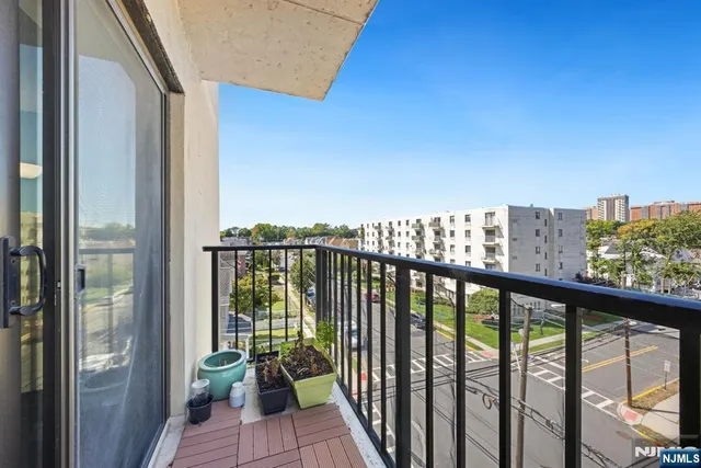 a view of a balcony with city view