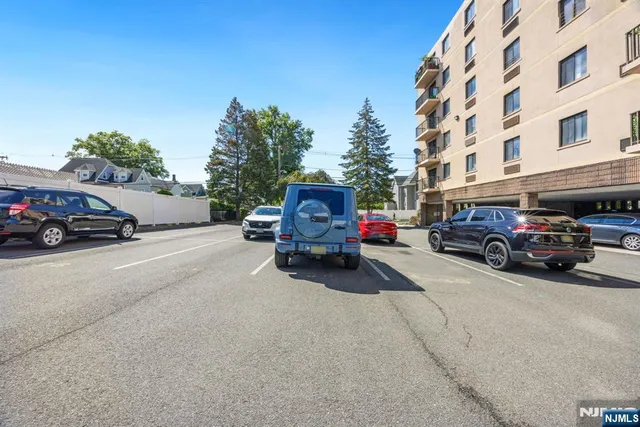 a view of a cars parked in front of a building