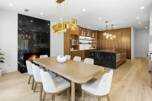 a living room with blue lights with furniture