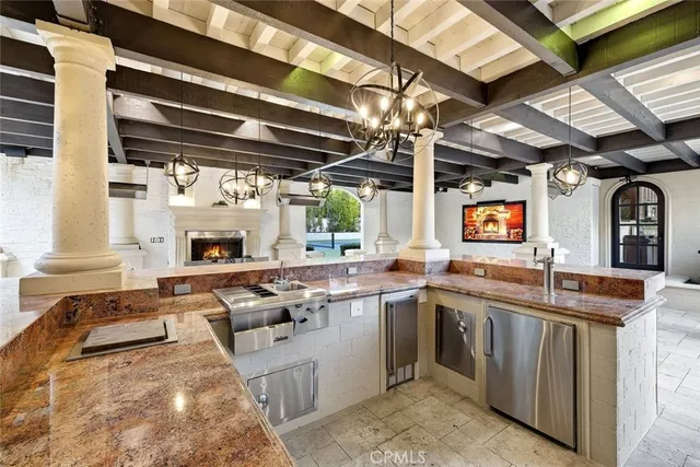 a spacious bathroom with double vanity sinks a large mirror and a bathtub