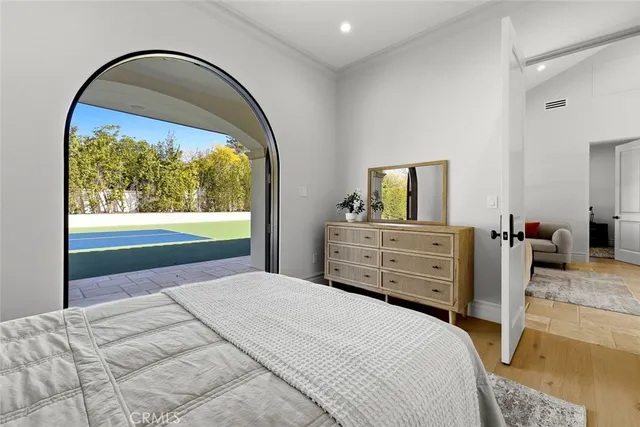 a view of a balcony with furniture and staircase