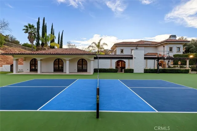 a view of a patio with swimming pool