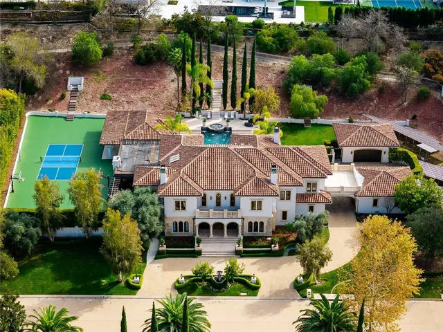 a view of a house with swimming pool