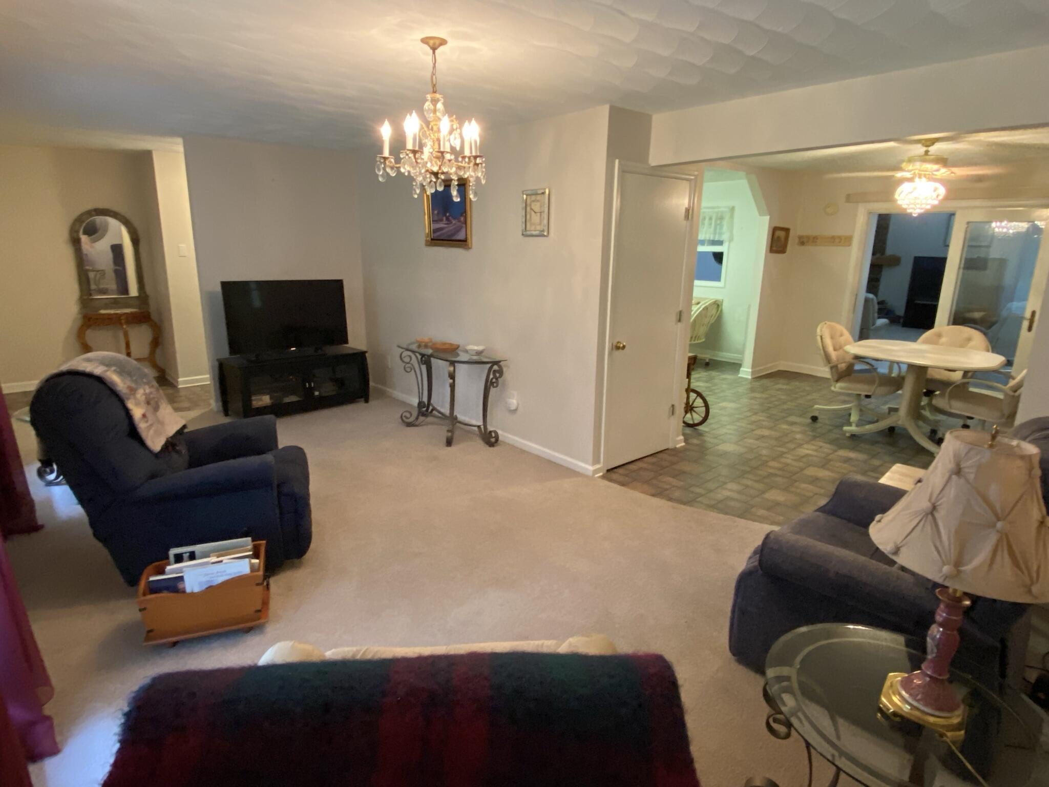 5378 Ferrum Mountain Road Callaway, VA 24067 - Photo 11 of 71 a bedroom with furniture and a flat screen tv