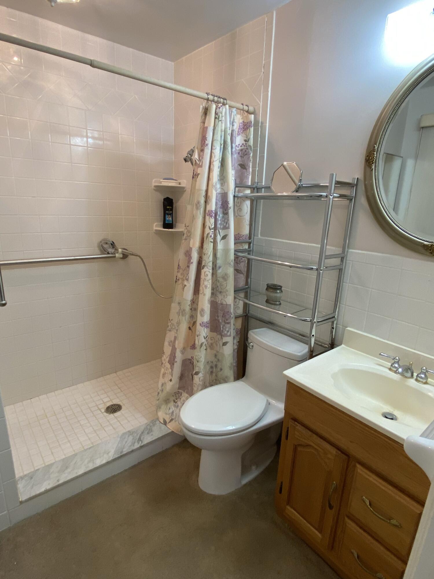 5378 Ferrum Mountain Road Callaway, VA 24067 - Photo 15 of 71 a bathroom with a sink a toilet and shower