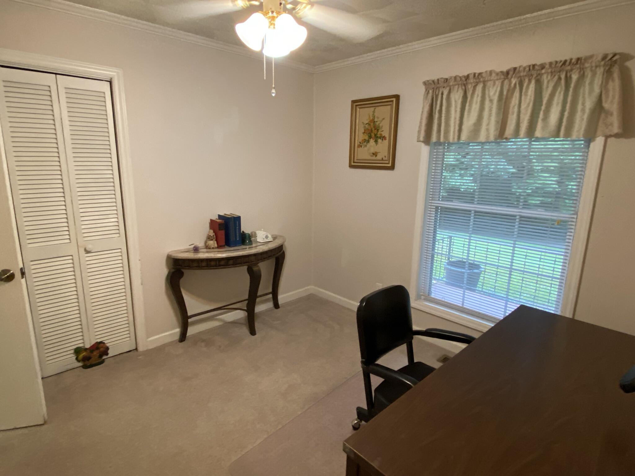 5378 Ferrum Mountain Road Callaway, VA 24067 - Photo 19 of 71 a work room with furniture and a window