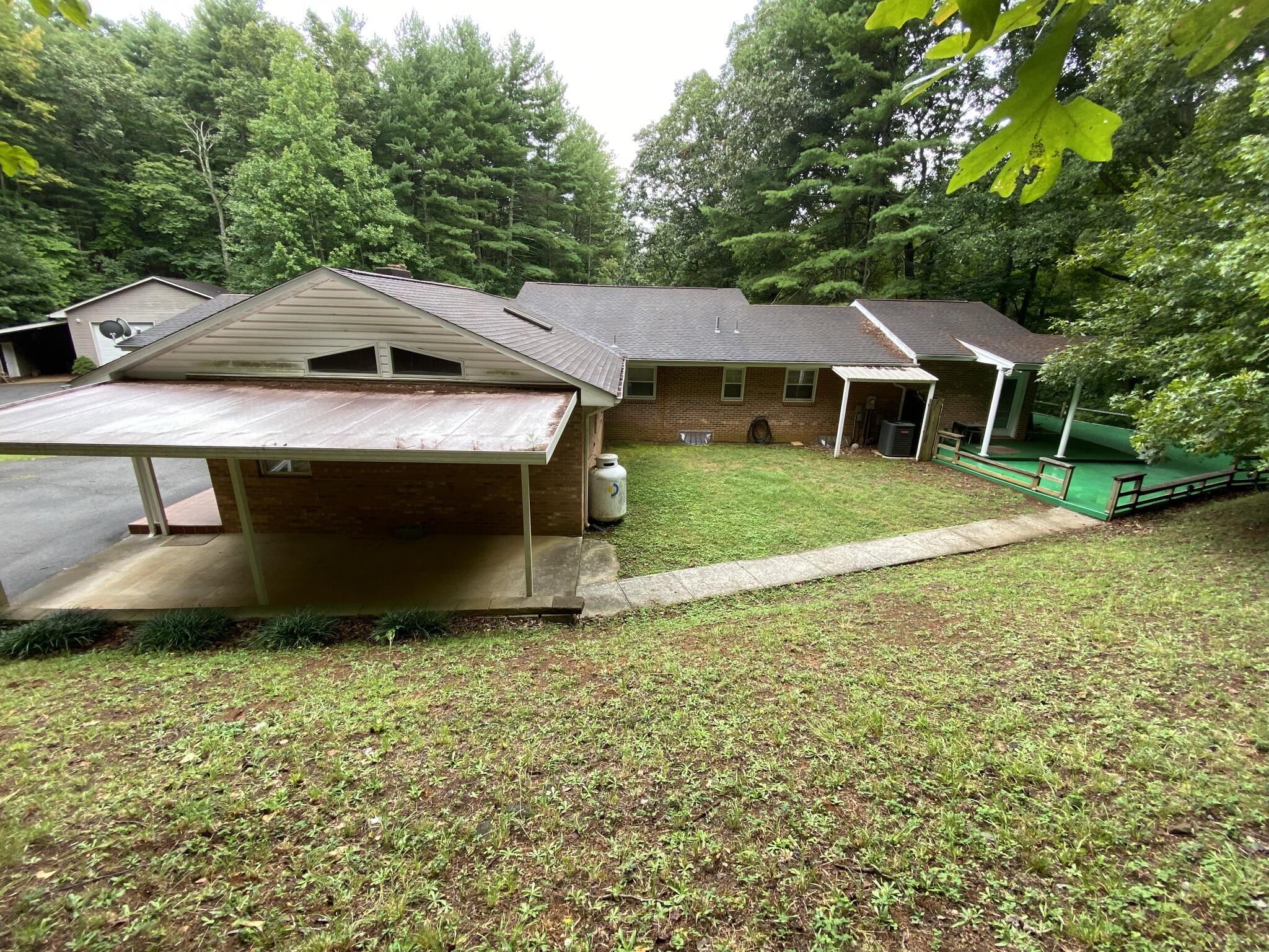 5378 Ferrum Mountain Road Callaway, VA 24067 - Photo 30 of 71 a view of a house with a yard
