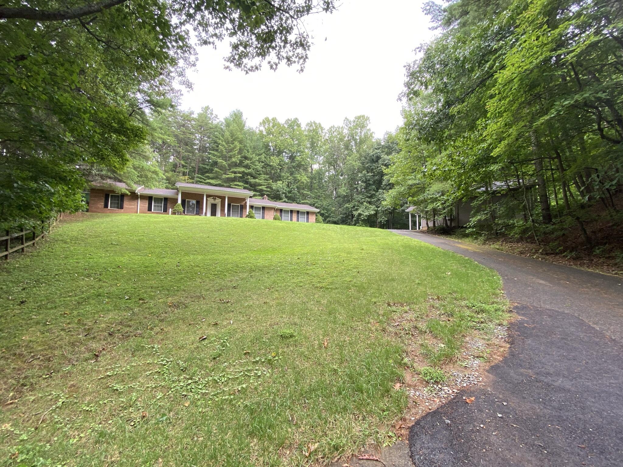 5378 Ferrum Mountain Road Callaway, VA 24067 - Photo 34 of 71 a view of an house with a yard