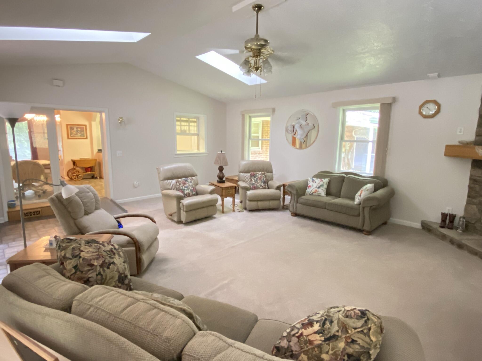 5378 Ferrum Mountain Road Callaway, VA 24067 - Photo 6 of 71 a living room with furniture ceiling fan and a window