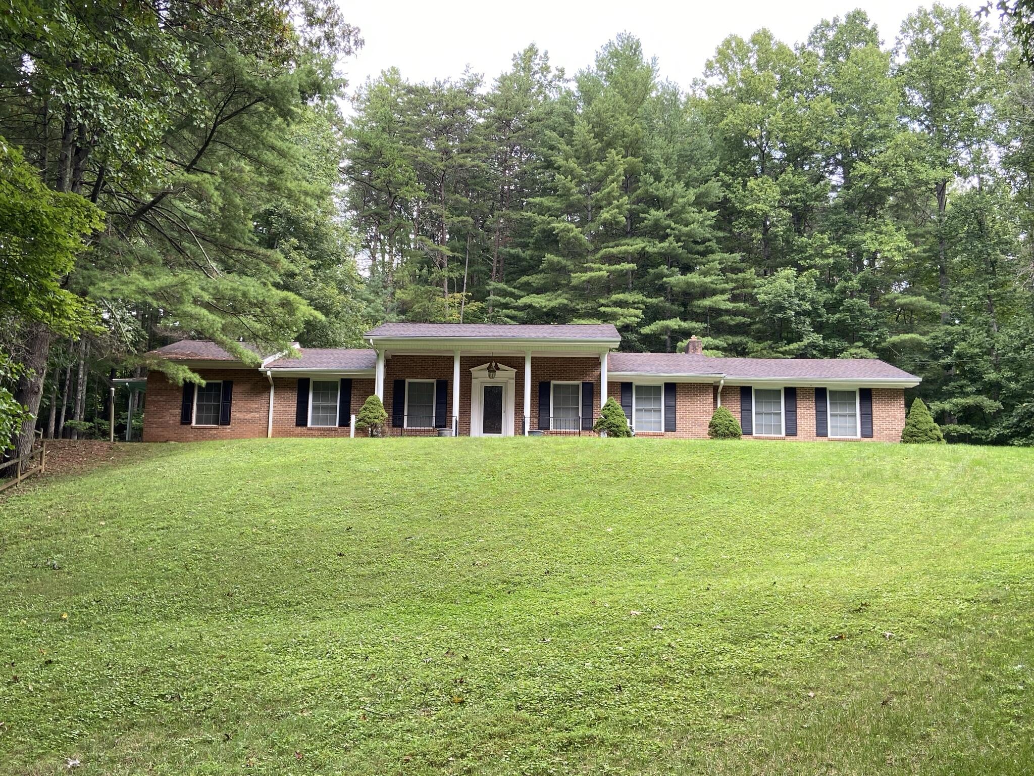 5378 Ferrum Mountain Road Callaway, VA 24067 - Photo 70 of 71 a front view of a house with a garden