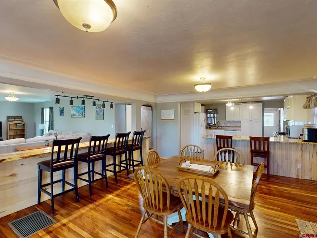 a view of a dining room with furniture