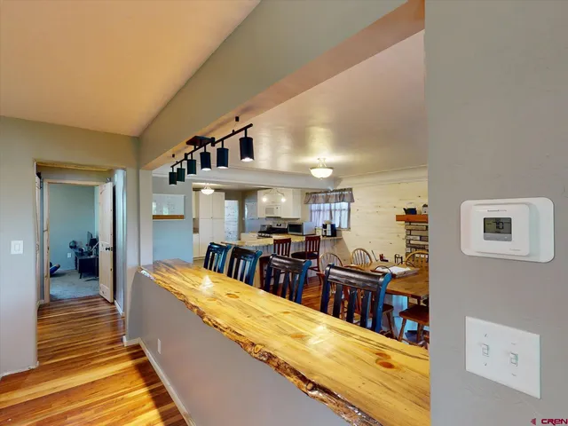 a view of a living room and dining room
