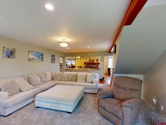 a living room with furniture and a couch