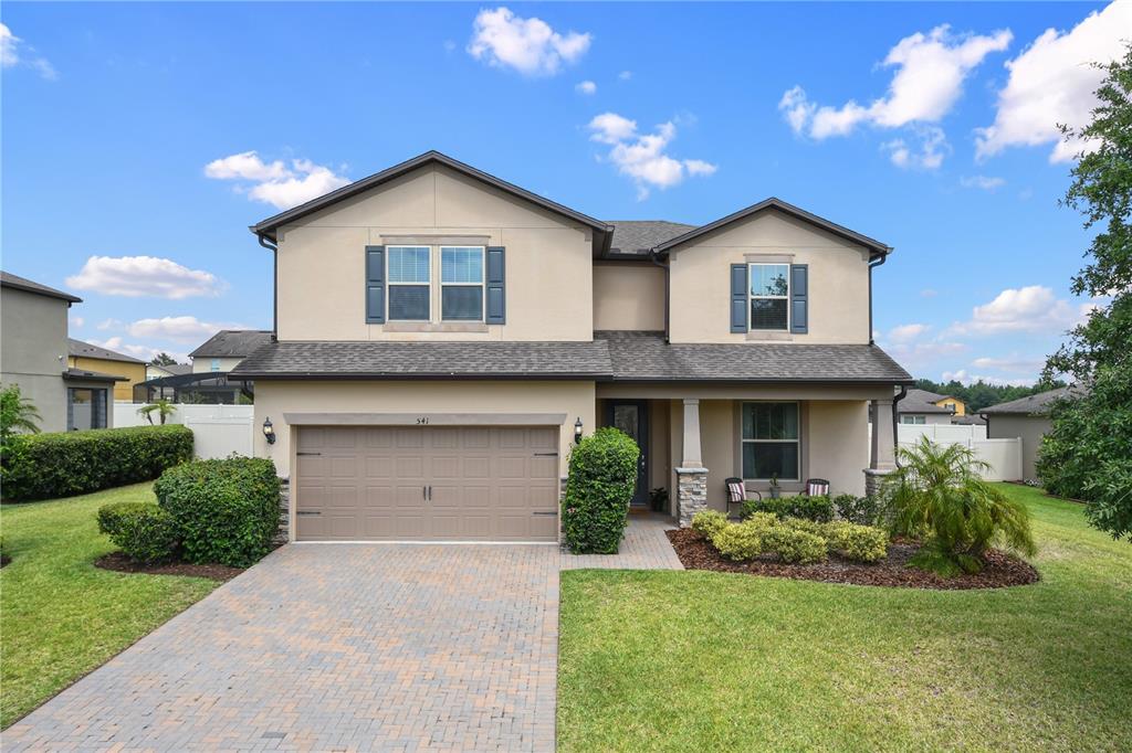 541 Keyhold Loop Apopka, FL 32712 - Photo 1 of 1 a front view of a house with a yard and garage
