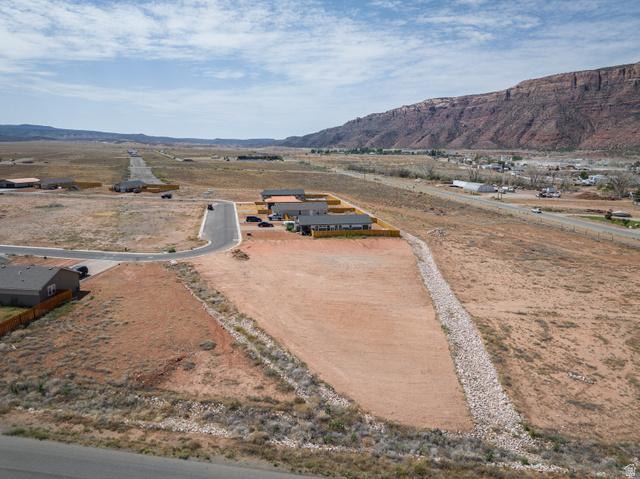 88 Lidia, Unit 22 Moab, UT 84532 - Photo 16 of 18 Expansive undeveloped lot featuring a defined property boundary and a gradual slope