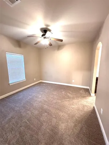 a bathroom with a double vanity sink and mirror